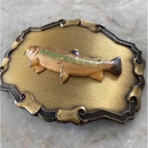 Brass buckle with embossed fish 
By Raintree